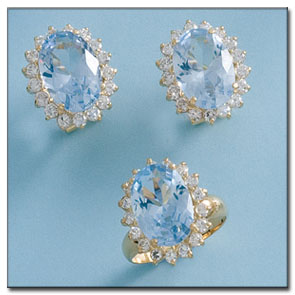 Sortija oro 18kl circonitas + piedra color